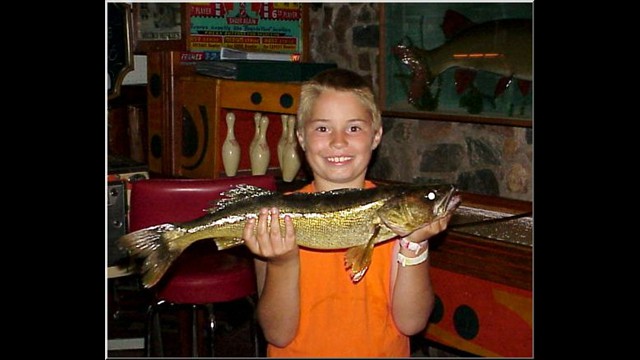 Young Boy With A Walleye